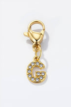 Charm alphabet scintillant en acier inoxydable