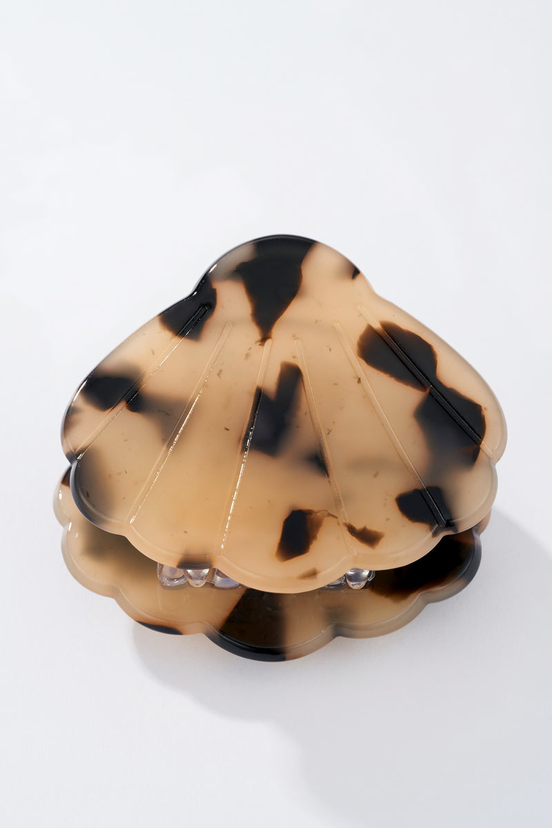 Pince à cheveux en forme de coquillage