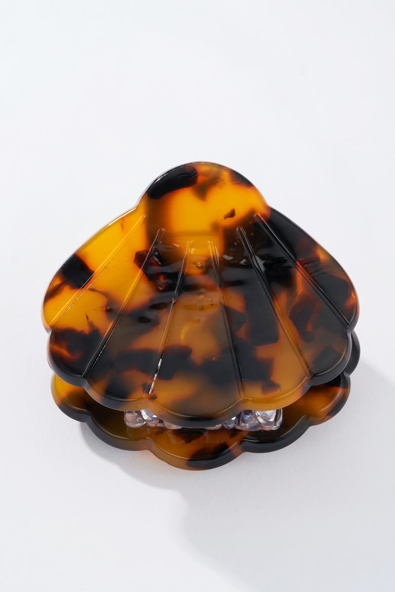 Pince à cheveux en forme de coquillage