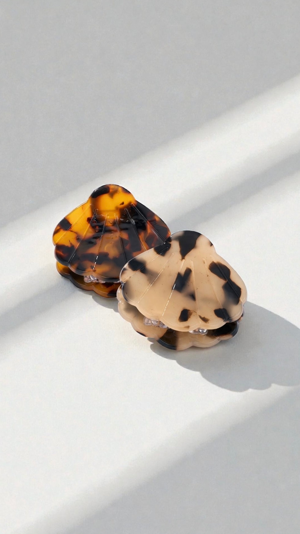 Pince à cheveux en forme de coquillage